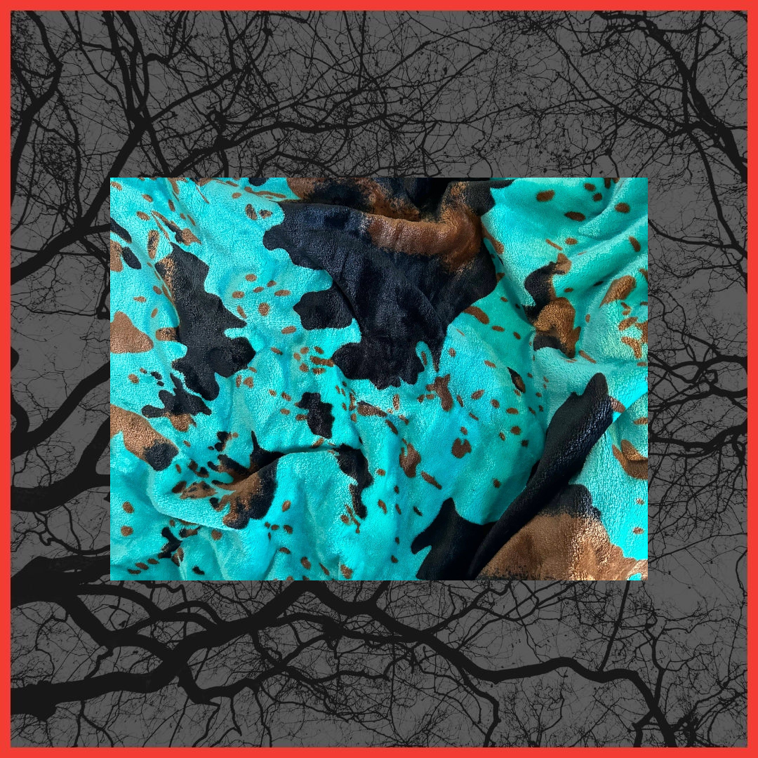 Turquoise Cow Print Blanket